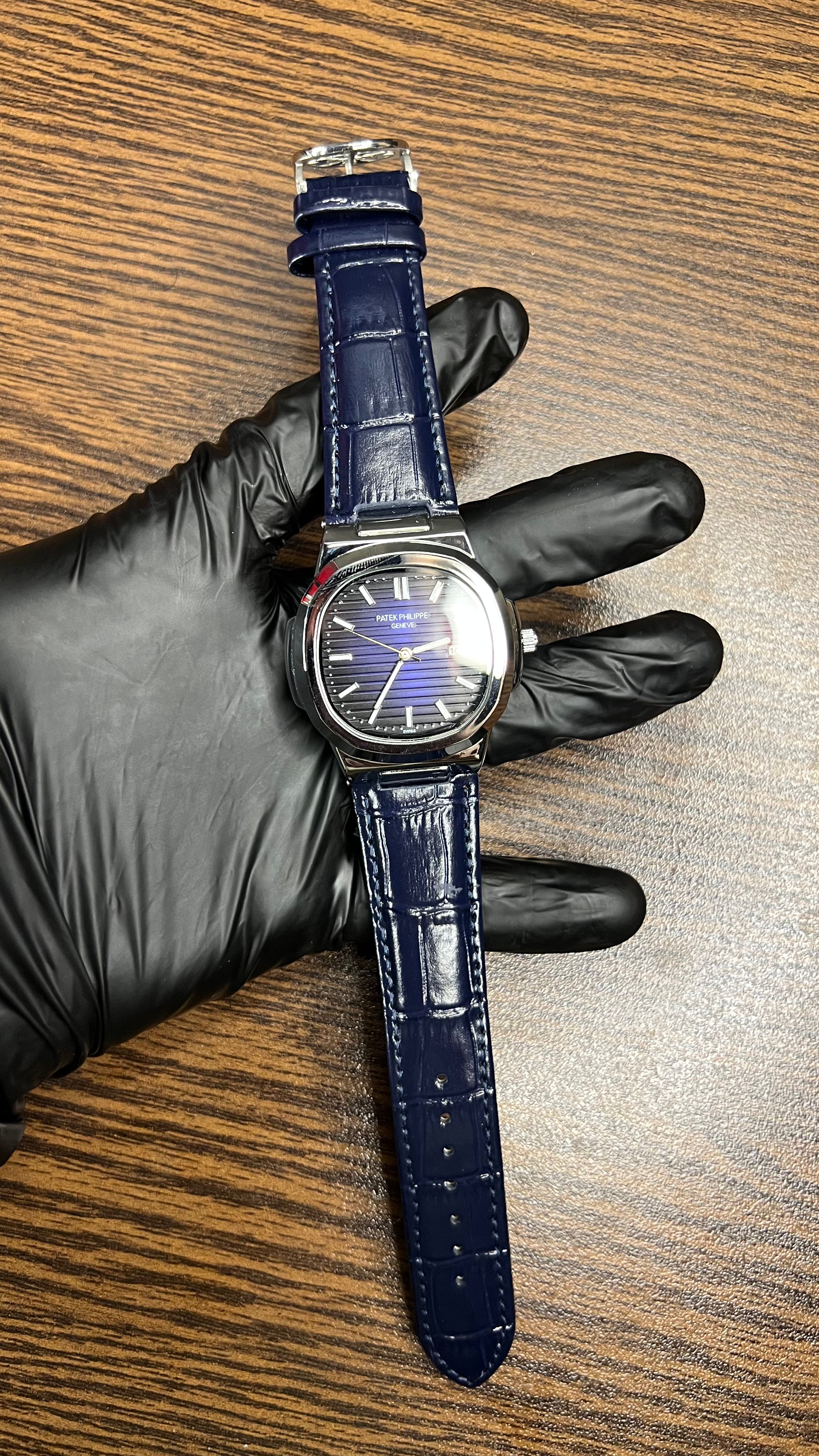 Patek Philippe Nautilus Stainless Steel & Black Leather Strap – Black Dial with Date Display