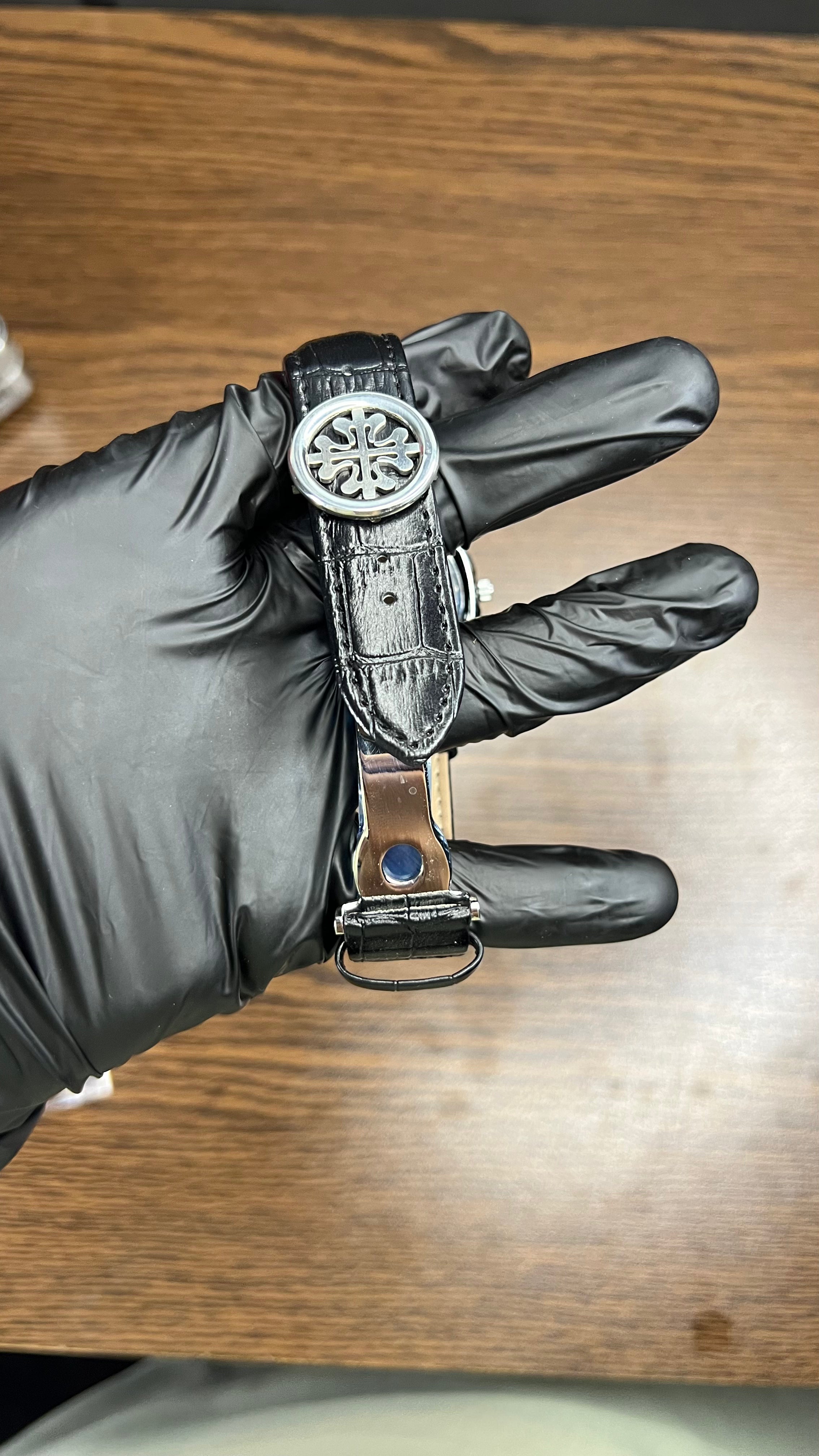 Patek Philippe Nautilus Stainless Steel & Black Leather Strap – Black Dial with Date Display